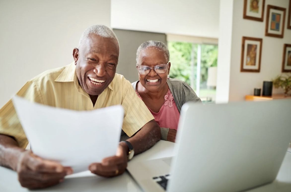 two seniors planning their retirement in a senior living community